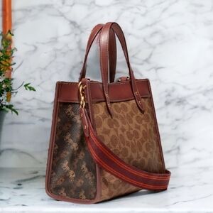 Coach Field Tote 22 in Signature Canvas with Horse and Carriage Print.